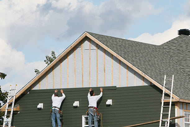 Professional Siding technician working in China Grove, NC